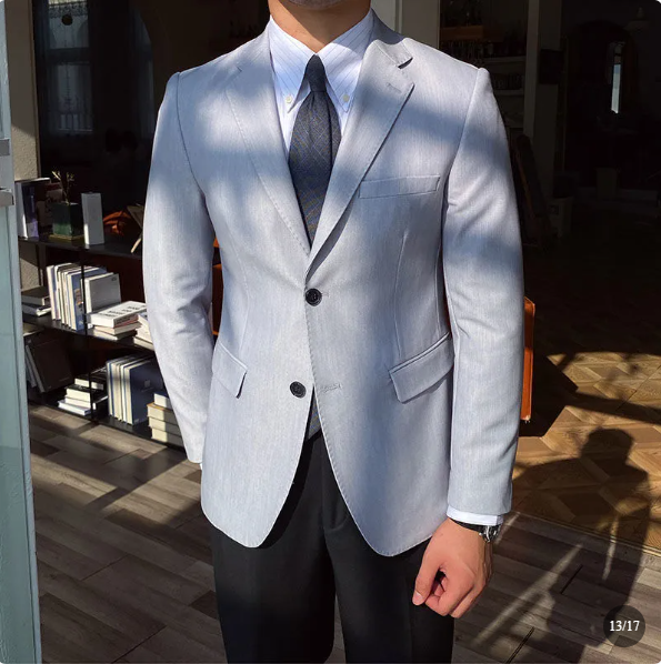 Elegant, skräddarsydd blazer med dubbelknäppning för herrar